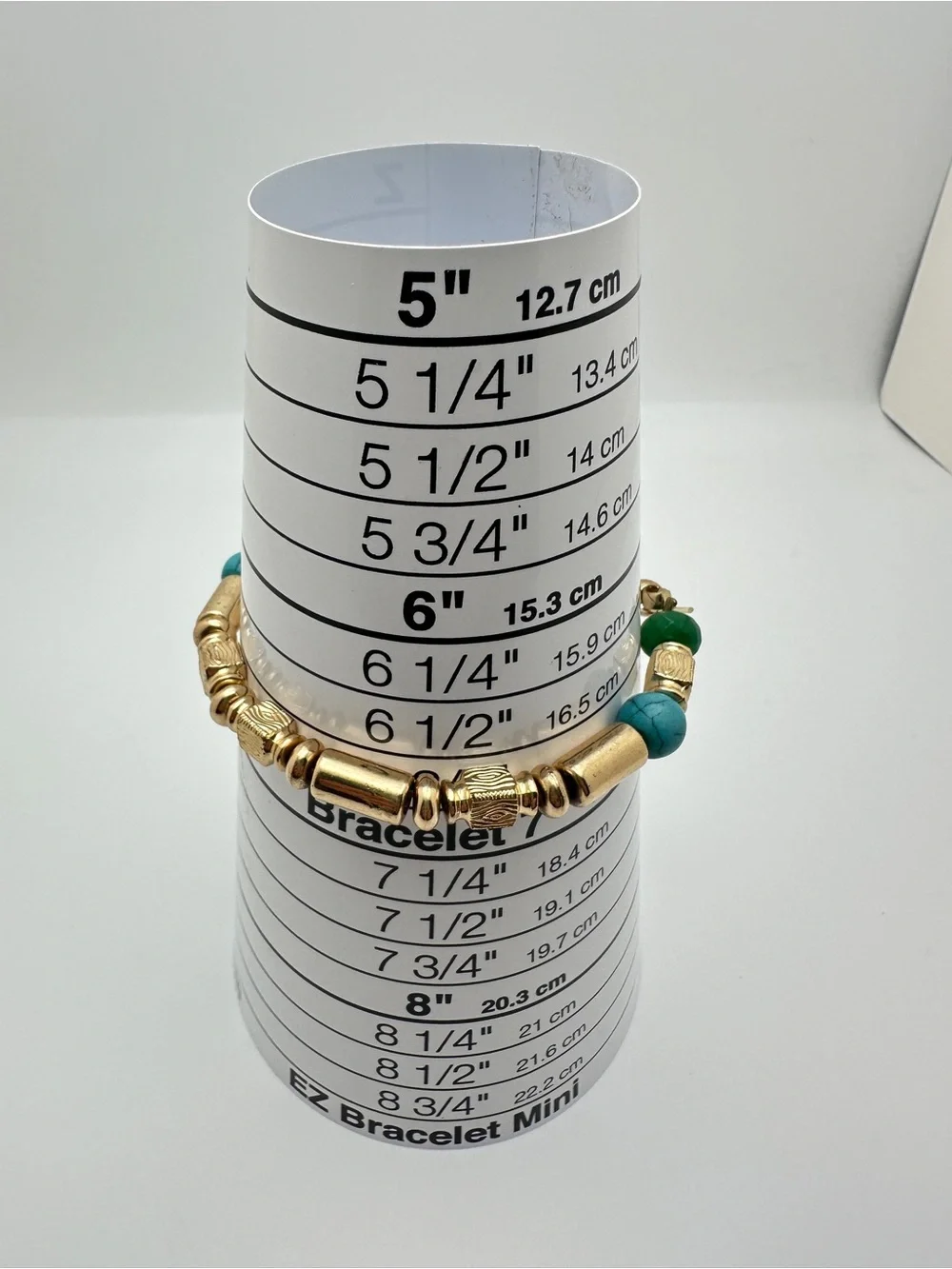 Gold-Tone Beaded Bracelet with Turquoise & Green Accents and multiple charms